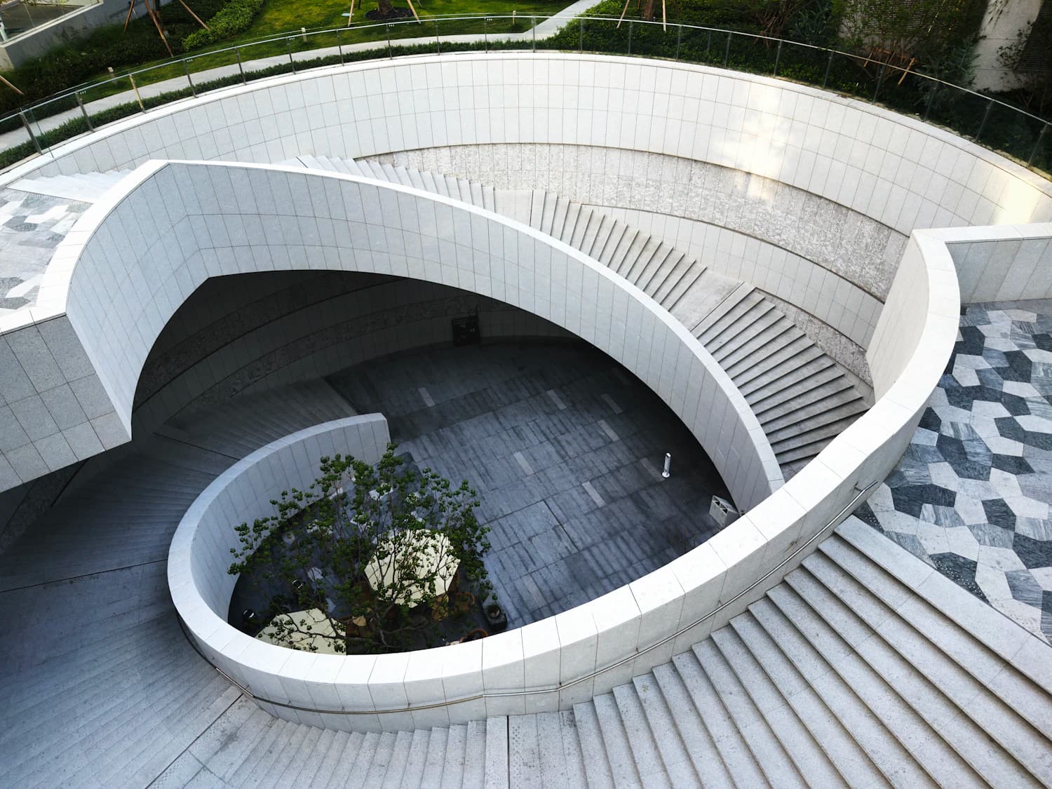 Sculptural stone staircase and courtyard architecture in Shenzhen
